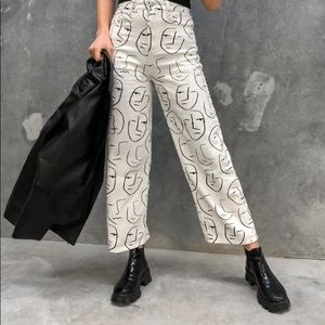 shekou abstract face print jeans -NWT